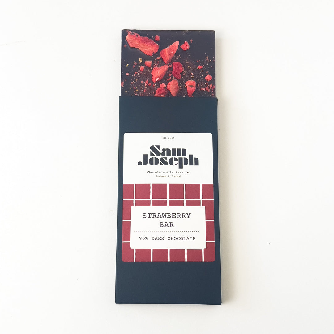 Strawberries and dark chocolate bar